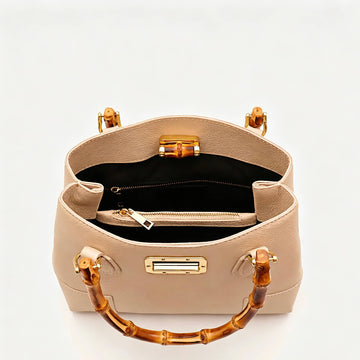 Medium Ginevra bag interior with two compartments and a zipped centre pocket