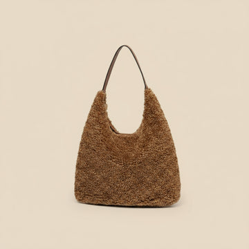 Anaïs Faux Shearling & Leather Hobo Handbag by Clemés in Mocha, three-quarter studio shot on grey background