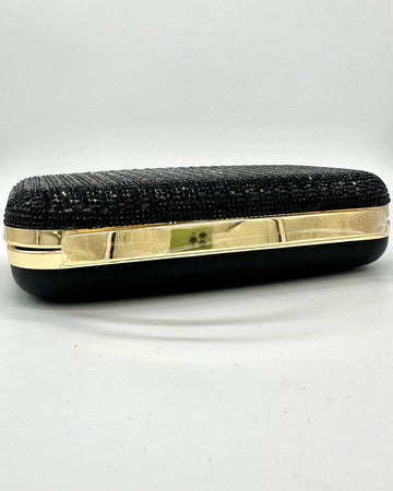 Odette Crystal Minaudière Clutch by Clemés in Black, side view with gold trim