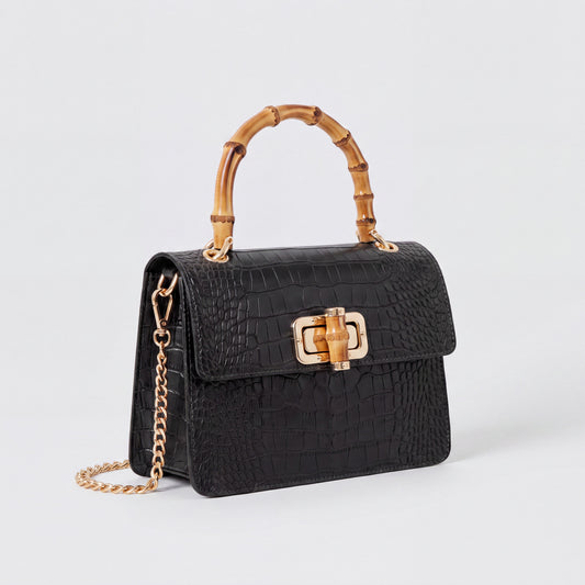 Black Clotilde Bamboo Croc Handbag by Clemés, studio shot