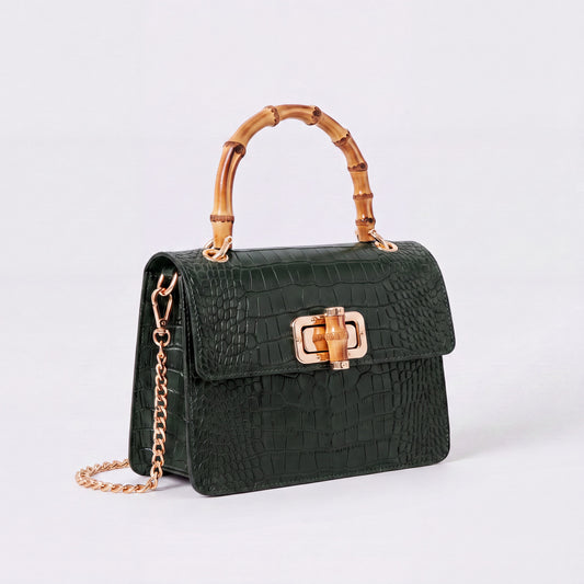 Dark Green Clotilde Bamboo Croc Handbag by Clemés, studio shot