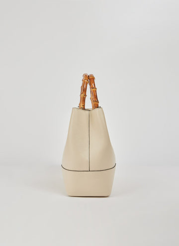 Ginevra Bamboo-Handle Leather Bag by Clemés in White, bucket bag studio shot