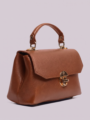 Clemés Lola Dollaro crossbody bag in Cognac leather, three-quarter view