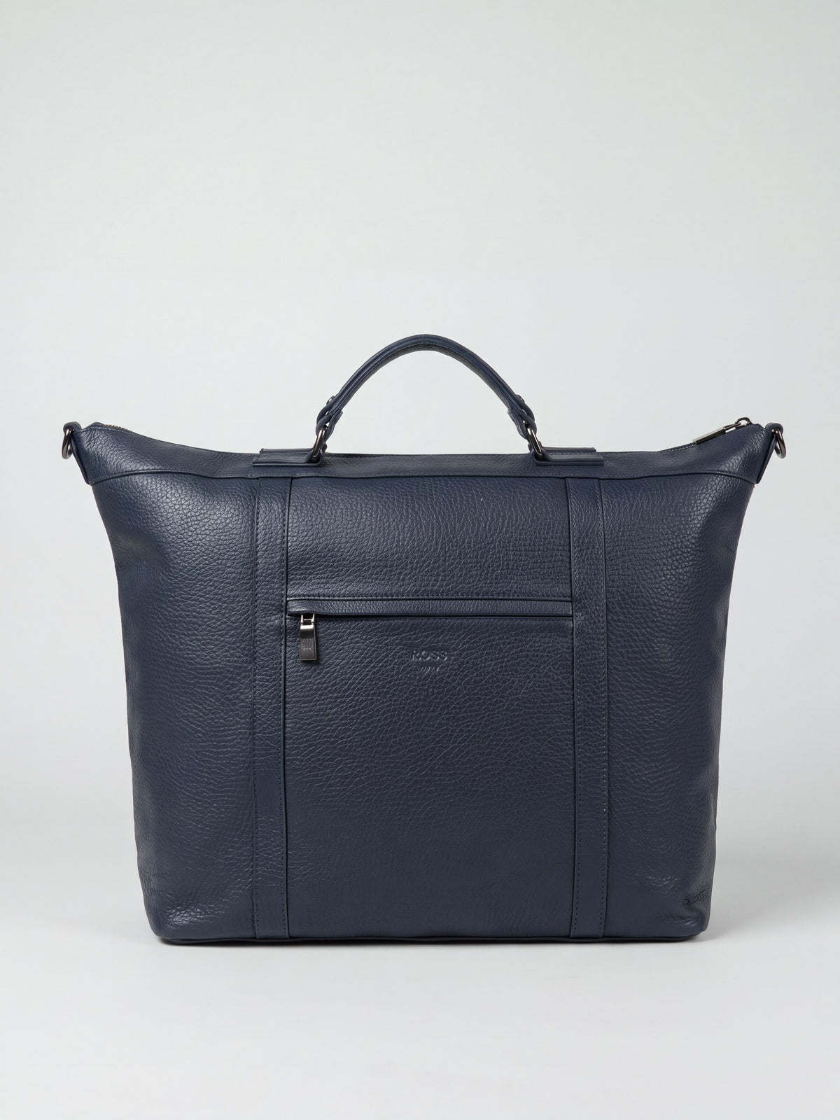 Alessio navy pebble-grain leather travel bag by Clemés, front view with top handle and front zip pocket