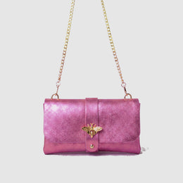 Anima Suede Leather Metallic Clutch Shoulder Bag by Clemés in Rose, studio shot on grey background