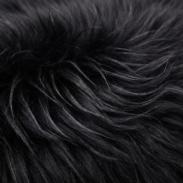 Close-up of Black long wool sheepskin fibres