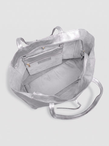 Carlotta oversized leather tote by Clemés in Silver metallic leather, interior view showing the light grey suede lining and zip pocket