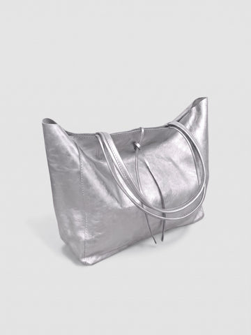 Carlotta oversized leather tote by Clemés in Silver metallic leather, three-quarter studio view