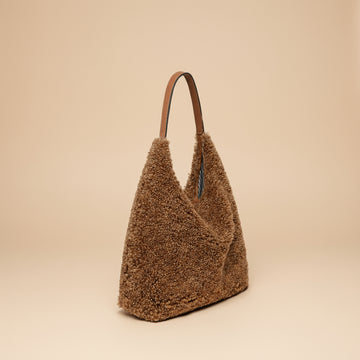 Anaïs Faux Shearling & Leather Hobo Handbag by Clemés in Mocha, studio shot