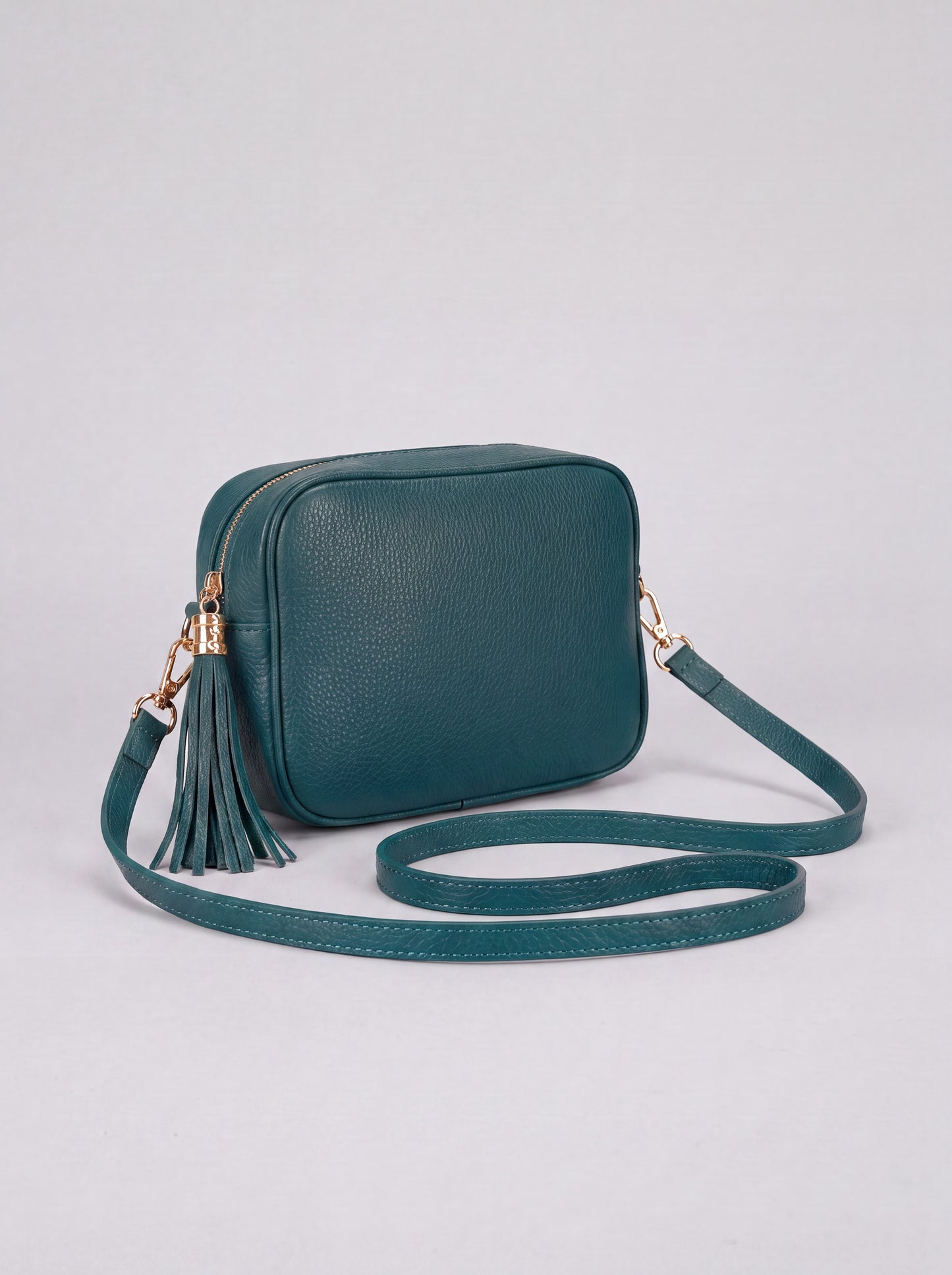 Éloise Leather Tassel Camera Bag by Clemés in Teal — studio product photo