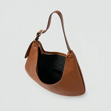 Ludovica leather hobo shoulder bag in tan, angled view, light grey studio background