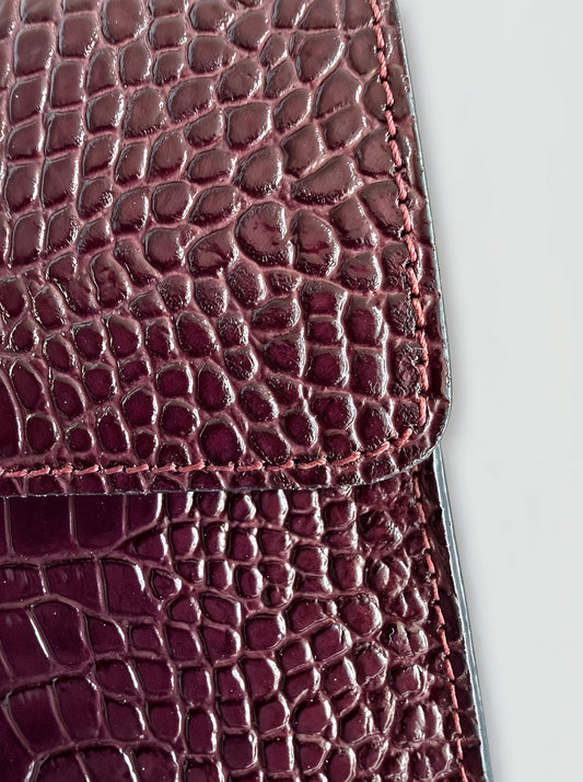 Clotilde Bamboo Croc Handbag by Clemés - Burgundy - close-up of crocodile-embossed leather stitched seam