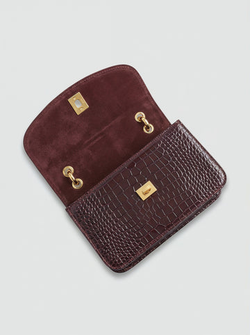 Clotilde Bamboo Croc Handbag by Clemés - Burgundy - interior view showing burgundy suede lining and gold hardware