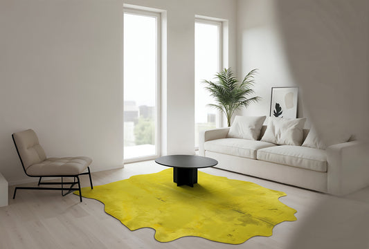 Acid wash yellow cowhide rug, side angle, in a minimalist living room