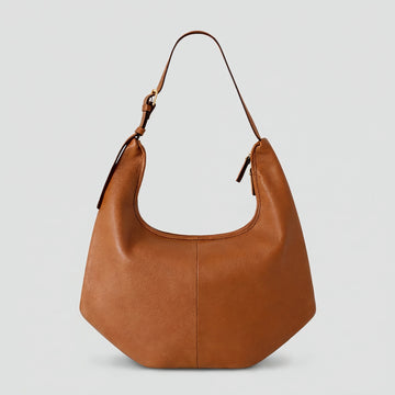Ludovica leather hobo shoulder bag in tan on a light grey studio background