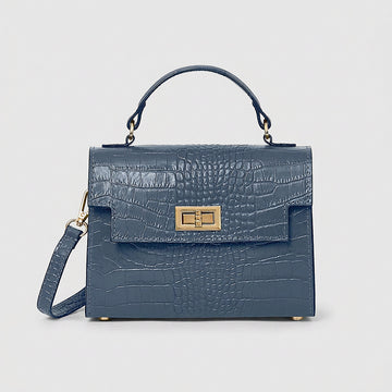 Dusty Blue Margot Croc crossbody bag, studio product photo on grey background