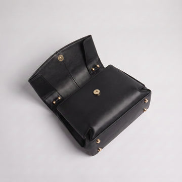 Fiorella bag in Black open at a high angle showing tonal interior