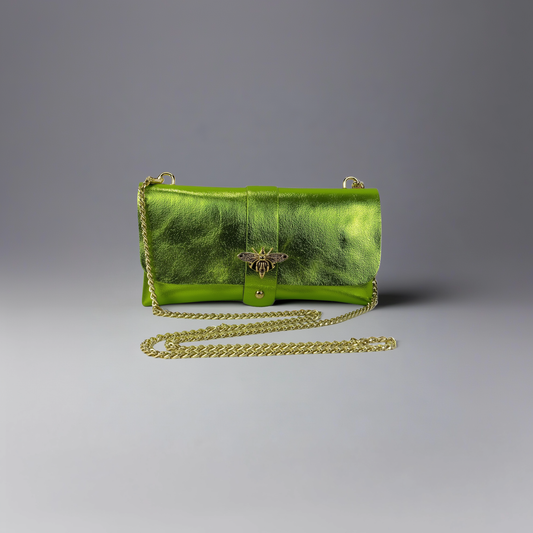 Anima Suede Leather Metallic Clutch Shoulder Bag by Clemés in Olive, studio shot on grey background