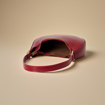 Mezzaluna Leather Shoulder Bag by Clemés in Dark Red, partial studio shot