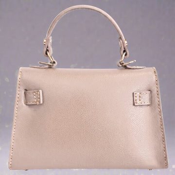 Back panel and saddle stitching of the Dusty Rose Mini Kelly-Inspired handbag by Clemés