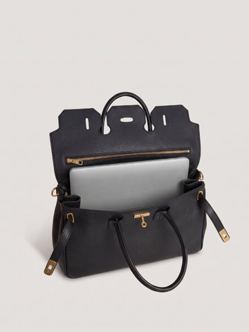Illustration of a laptop lying in the open main compartment of the Letizia Black Calfskin Bag by Clemés