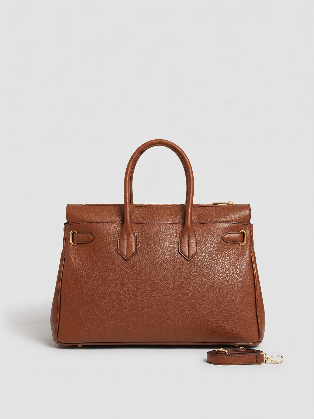 Letizia Cognac Calfskin Bag by Clemés – front view with strap beside the bag