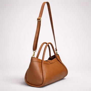 Bianca Leather Mini Bag by Clemés in Dark Tan, studio shot with double handles
