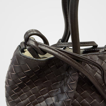 Ornella woven leather bag knotted top handle detail
