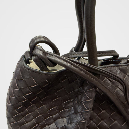 Ornella woven leather bag knotted top handle detail