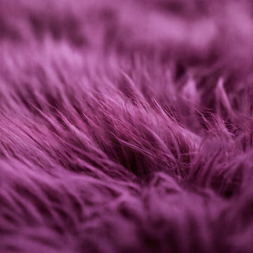 Close-up of purple sheepskin wool texture
