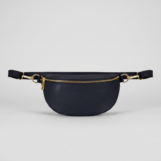 Romy leather crossbody bum bag in Navy on light grey studio background