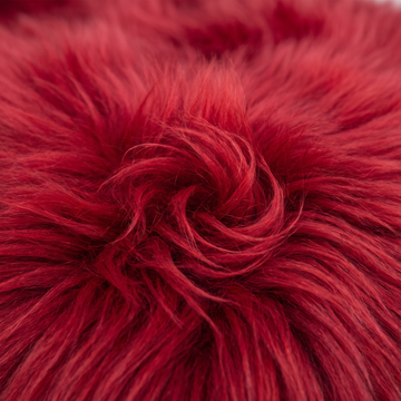 Close-up of Wildfire red long wool sheepskin fibres