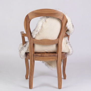Twilight sheepskin over an armchair back, suede leather underside facing the camera