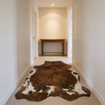 HN-23304 cowhide rug in hallway entryway