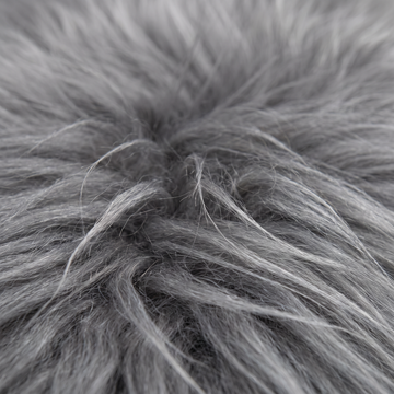 Close-up of grey long wool sheepskin fibres