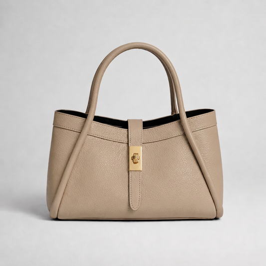 Bianca Leather Mini Bag by Clemés in Light Taupe, three-quarter studio shot on grey background