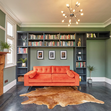 Warm caramel solid natural cowhide rug styled on the floor of an editorial interior