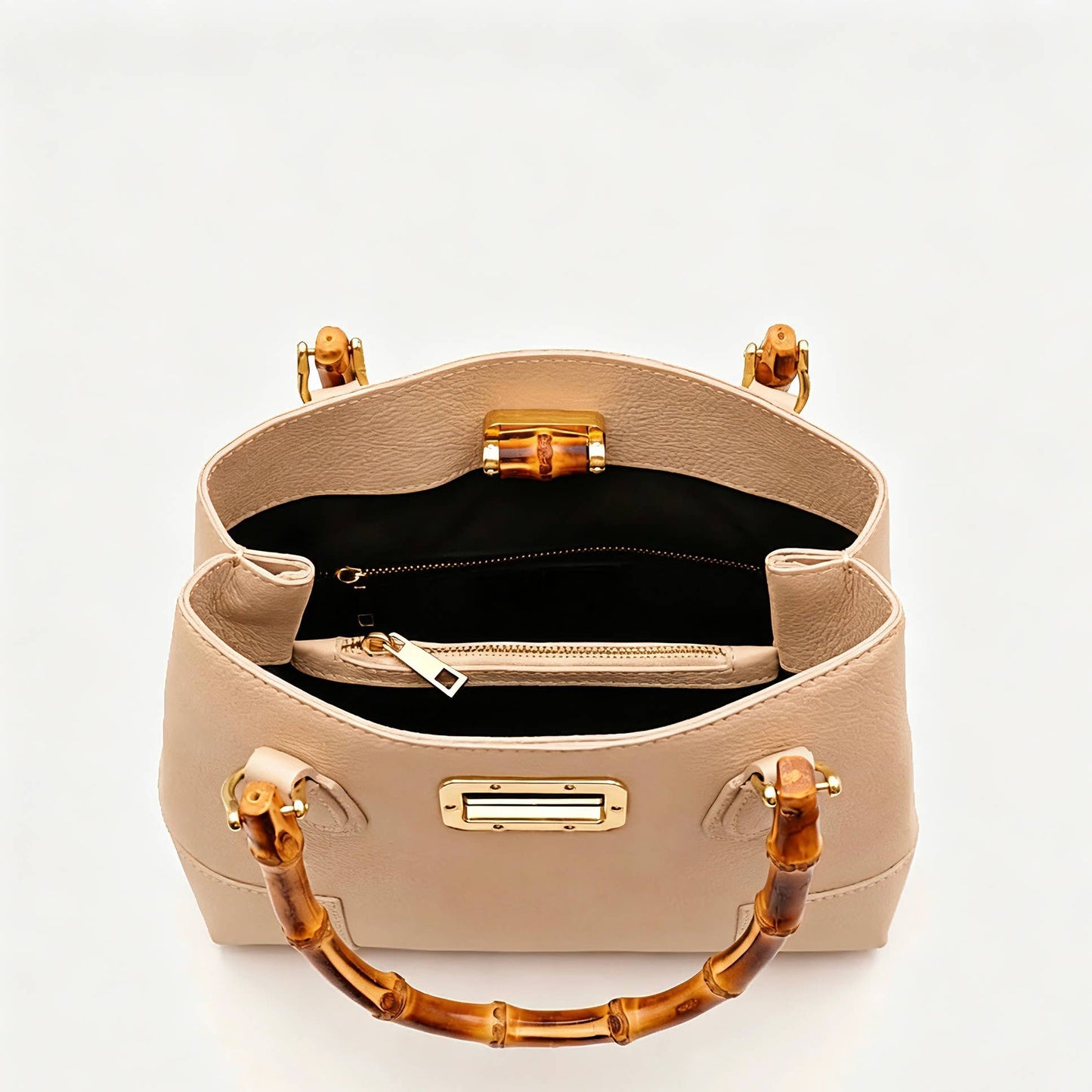 Medium Ginevra bag interior with two compartments and a zipped centre pocket