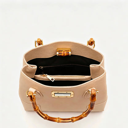 Medium Ginevra bag interior with two compartments and a zipped centre pocket