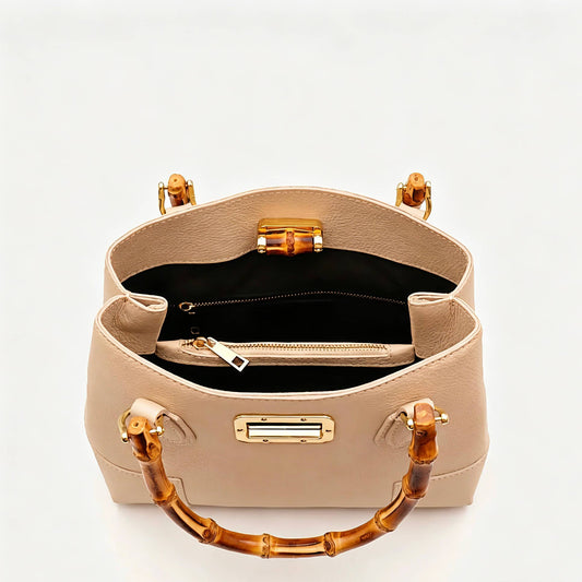Medium Ginevra bag interior with two compartments and a zipped centre pocket
