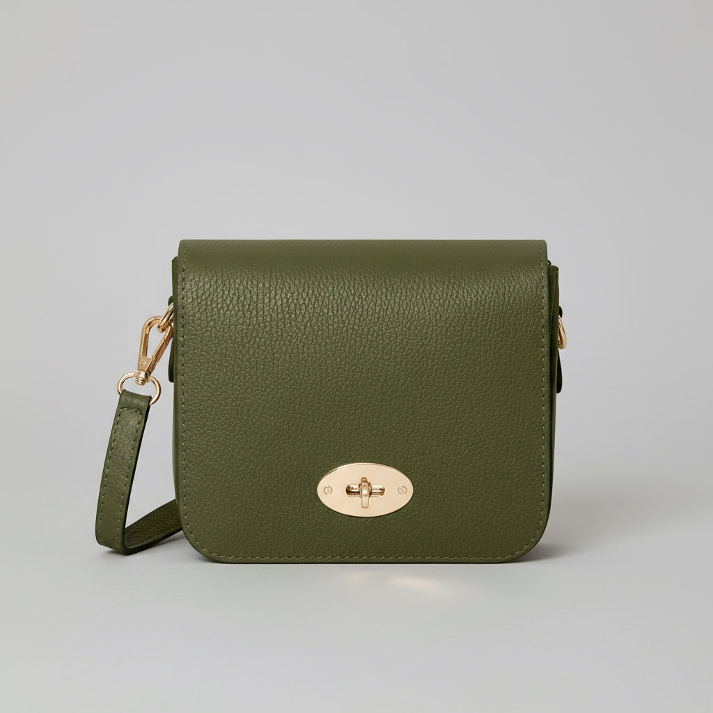 Chiara Leather Crossbody by Clemés in Dark Olive, three-quarter studio shot on grey background
