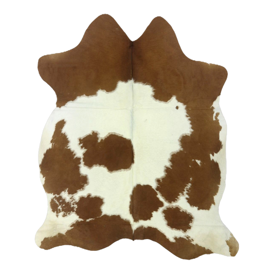 Brown and white cowhide rug, cut-out on transparent background