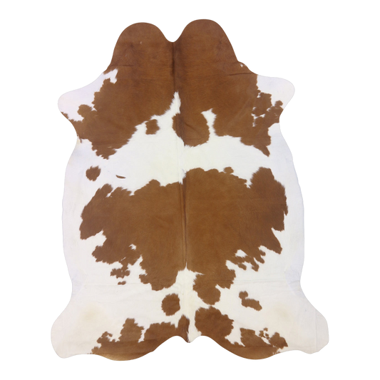 Brown and white cowhide rug, cut-out on transparent background