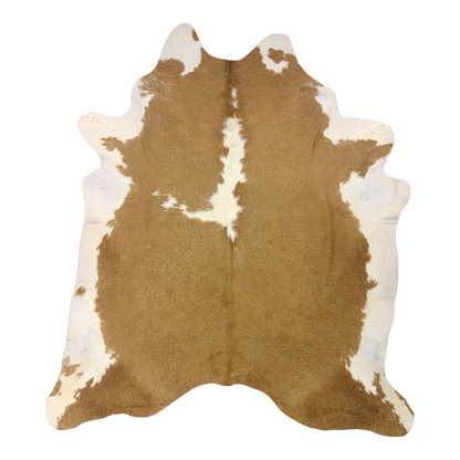 Beige and white cowhide rug, cut-out on transparent background