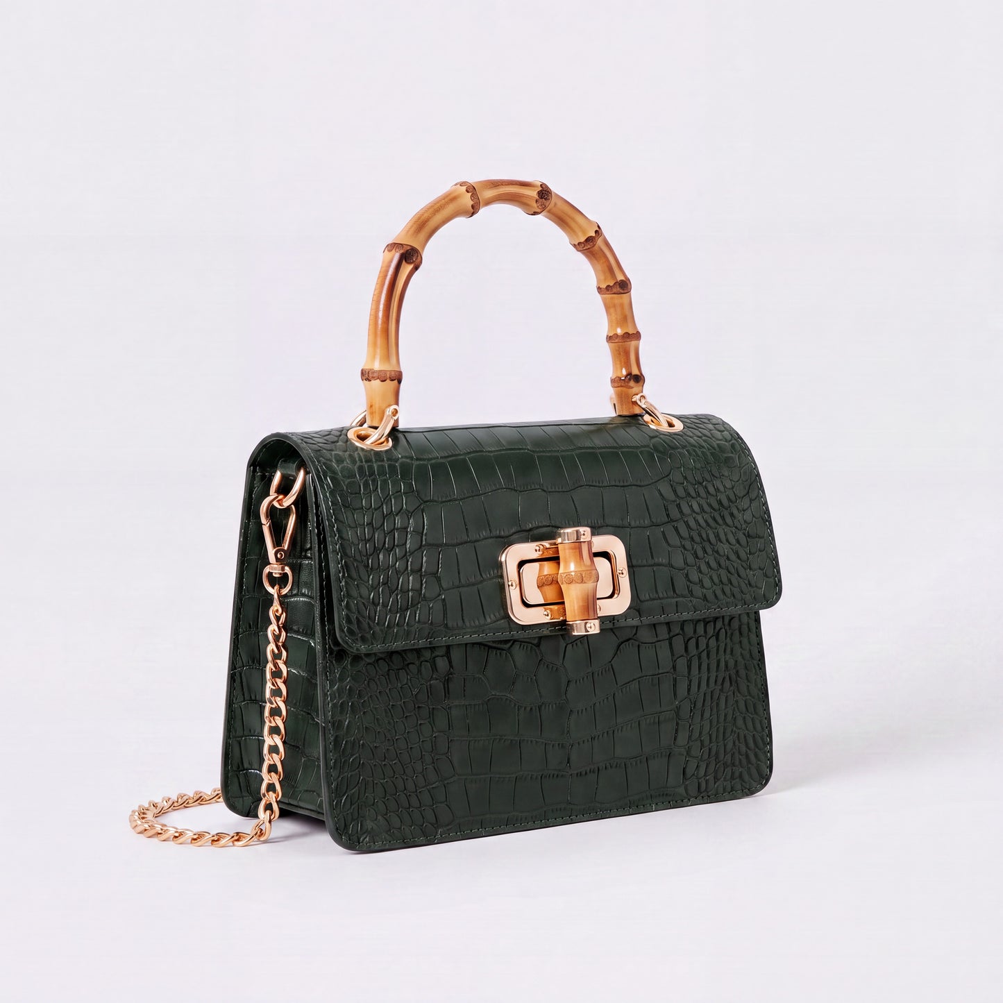 Dark Green Clotilde Bamboo Croc Handbag by Clemés, studio shot