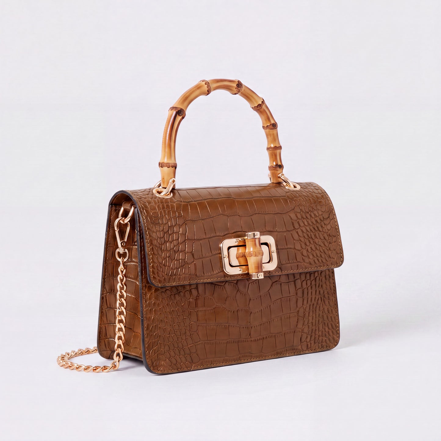 Dark Tan Clotilde Bamboo Croc Handbag by Clemés, studio shot