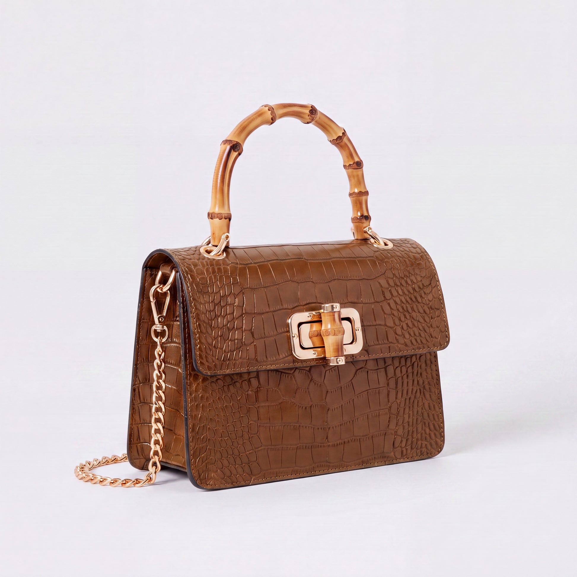 Dark Tan Clotilde Bamboo Croc Handbag by Clemés, studio shot