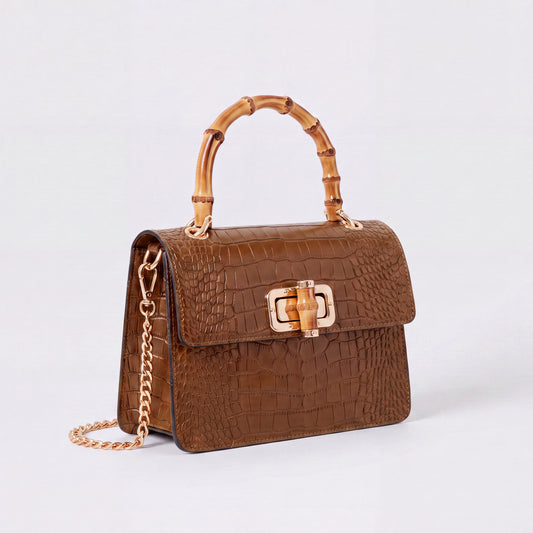 Dark Tan Clotilde Bamboo Croc Handbag by Clemés, studio shot