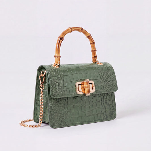 Dusty Green Clotilde Bamboo Croc Handbag by Clemés, studio shot