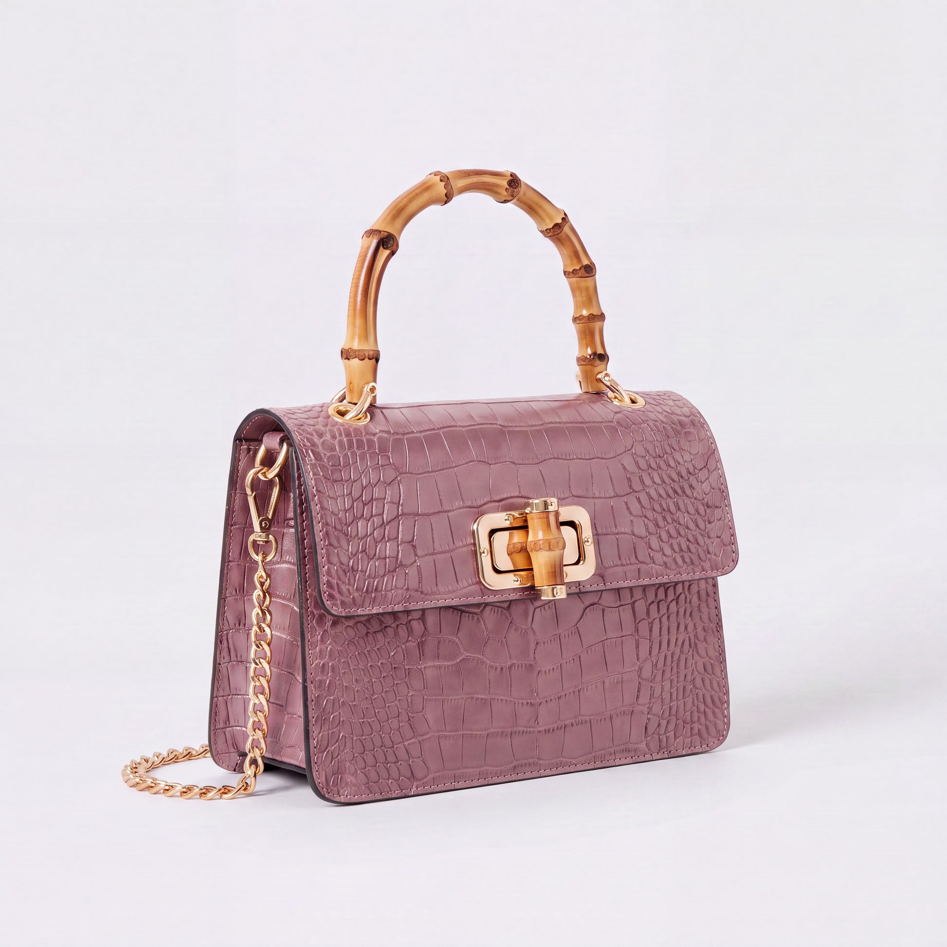 Dusty Pink Clotilde Bamboo Croc Handbag by Clemés, studio shot